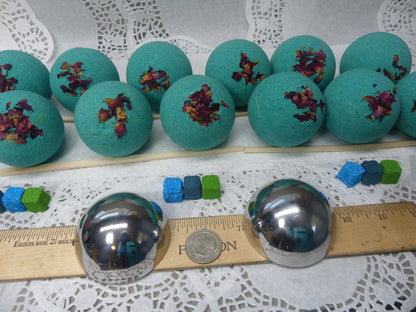 A photo of Bath Bomb - Breathe Bath Bomb with teal color, accented with potpourri 