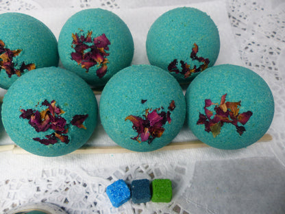 A photo of Bath Bomb - Breathe Bath Bomb with teal color, accented with potpourri 