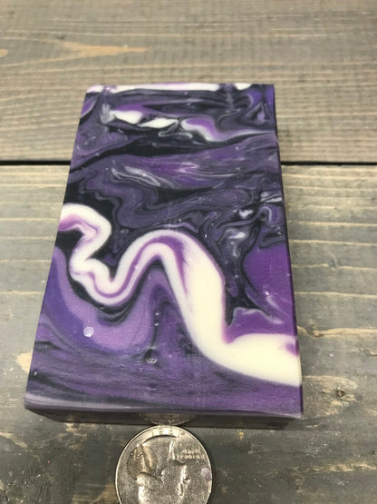 A photo of Lavender Martini with Banded Amethyst Stone on top of Bar Soap