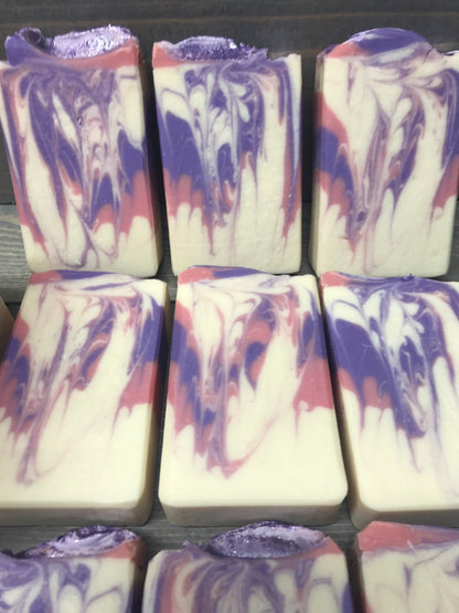 A photo of Honeysuckle Jasmine Soap with suttle amounts of purple and pink