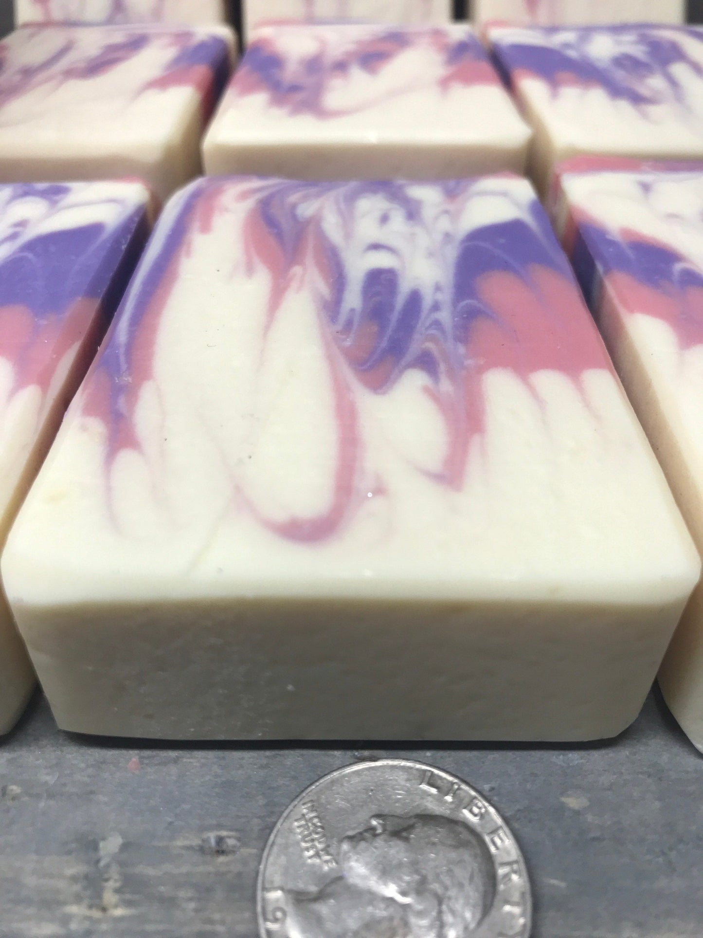 A photo of Honeysuckle Jasmine Soap with suttle amounts of purple and pink