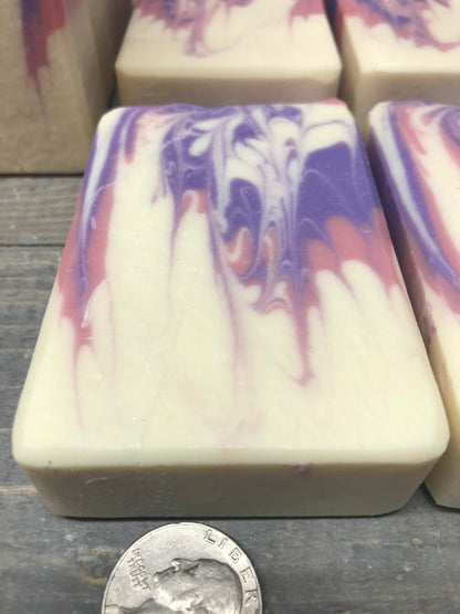 A photo of Honeysuckle Jasmine Soap with suttle amounts of purple and pink