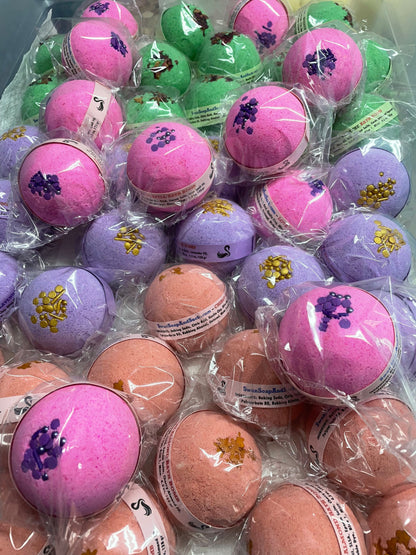 a photo of Cherry Almond Bath Bombs with Embeds and sugar sprinkles of gingerbread men