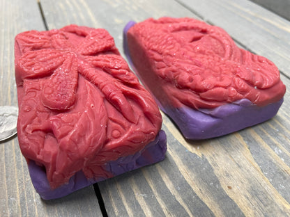 A photo showing detail of the Dragon Eye and Dragonfly Soap bars