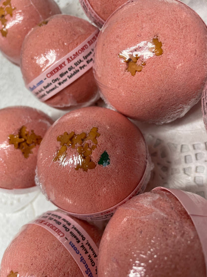 a photo of Cherry Almond Bath Bombs with Embeds and sugar sprinkles of gingerbread men