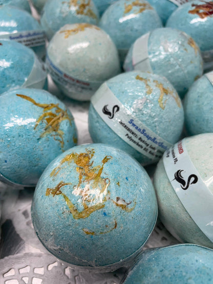 a photo of Honeysuckle Jasmine Bath Bombs, with real flower petals, Rose petals or Calendula Flower Petals in a light blue color