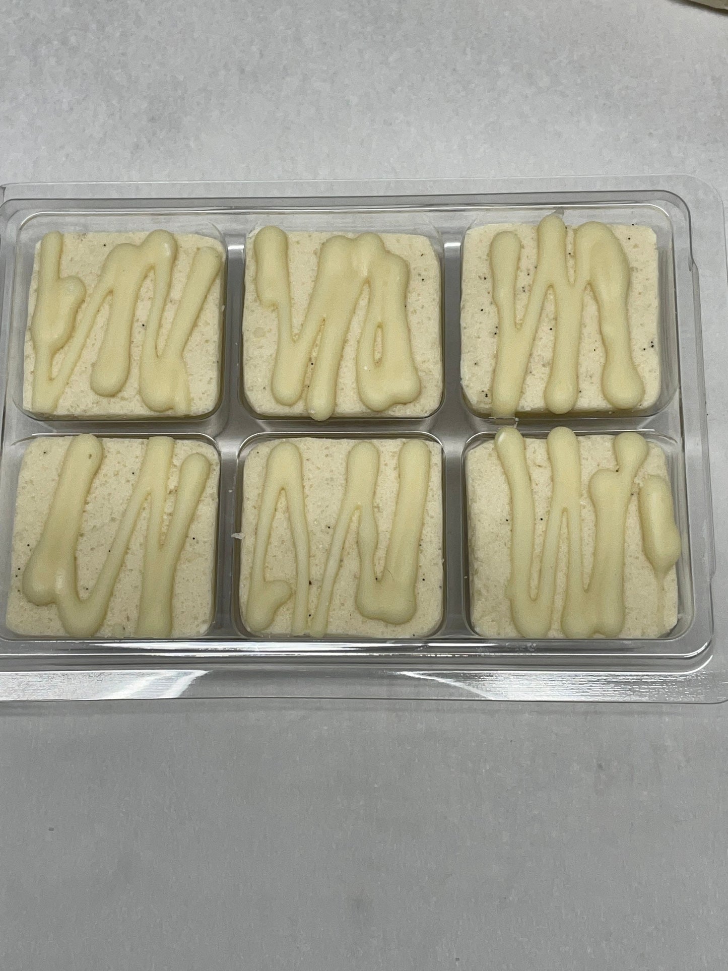 A photo of a six pack of Vanilla Shower Bubble Scrub Body Bars