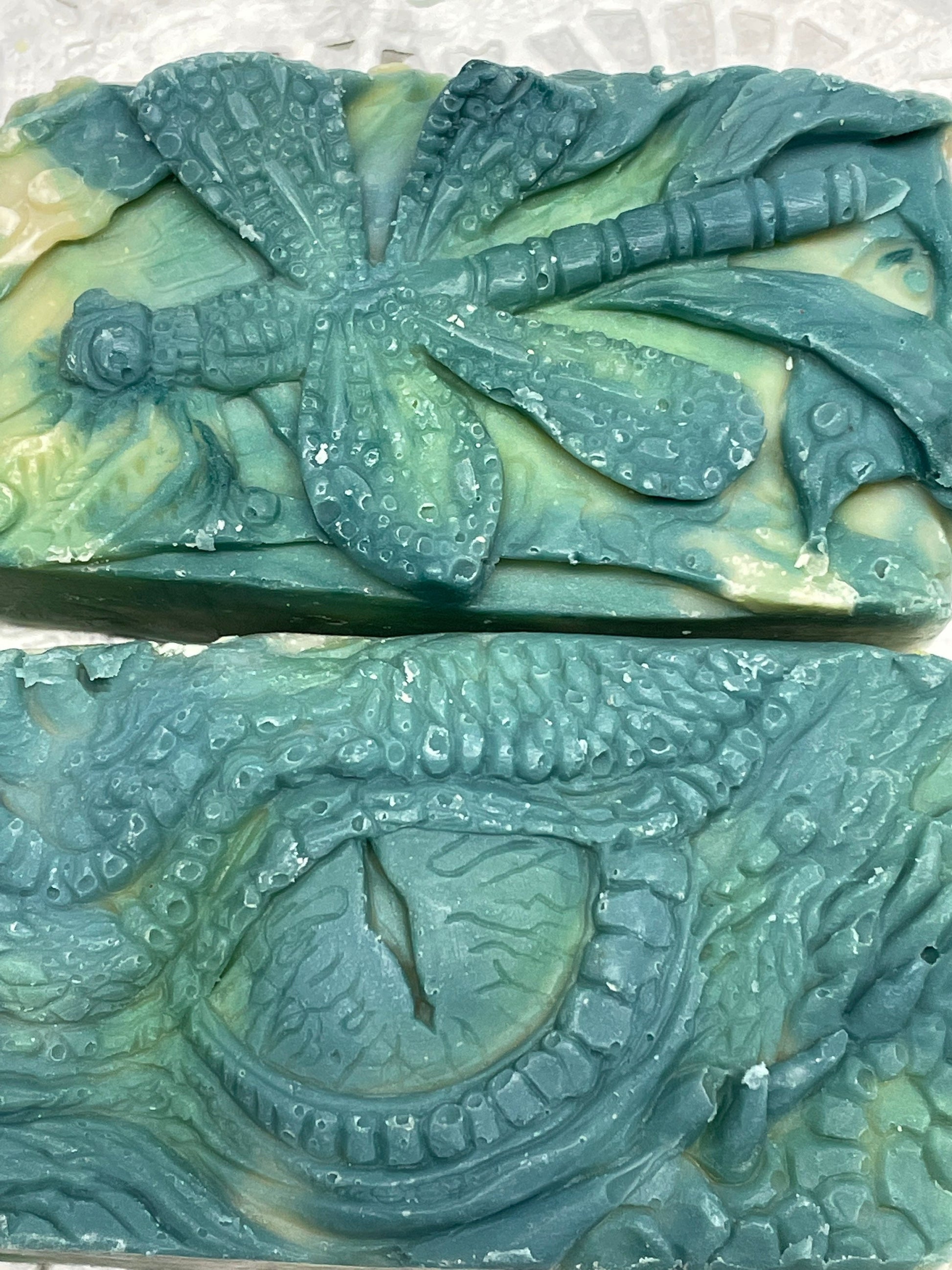 A photo of Dragon Eye and Dragonfly Aloe Vera and Cucumber Soap side by side