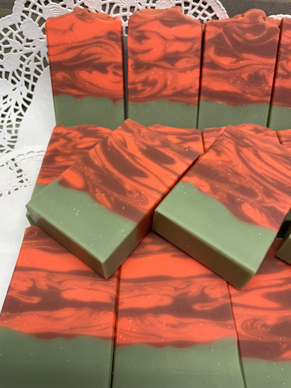 A photo of several Cranberry Orange Soap bar soap.