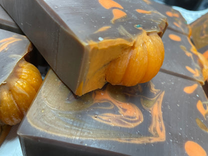 A photo showing Pumpkin Spice Soap Soap with brown and orange colors