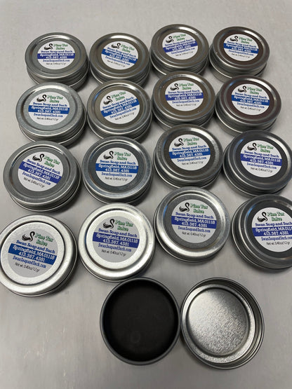 A photo showing a container of Pine Tar Salve