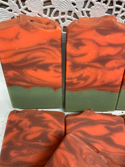 A photo of several Cranberry Orange Soap bar soap.