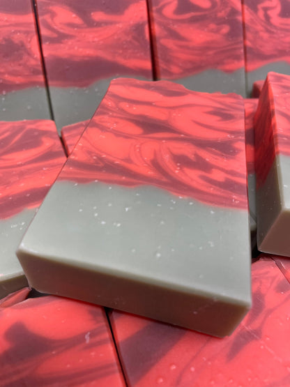 A photo of several Cranberry Orange Soap bar soap.